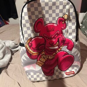 Sprayground Gray Checkered Backpack with Bold Pink Bear